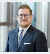 Dr. Michael Huertas, PwC